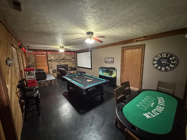 a room with furniture and a flat screen tv