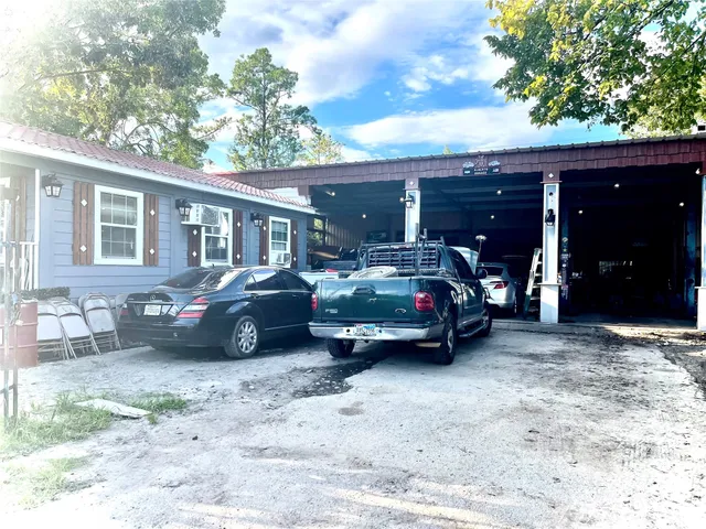 a view of a car in front of a house