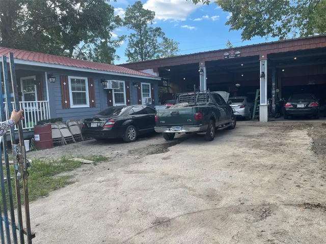 a car parked in front of a house