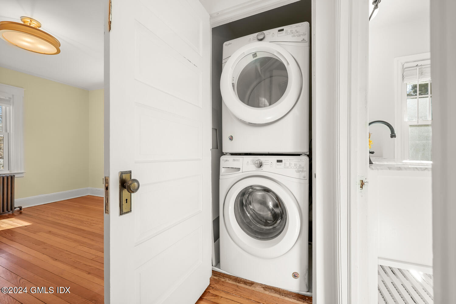 328 Delavan Avenue Greenwich, CT 06830 - Photo 23 of 29 a view of a hallway with washer and dryer