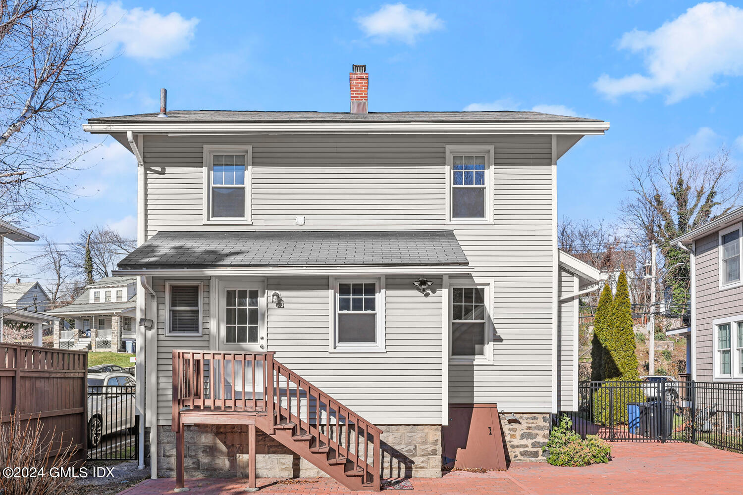 328 Delavan Avenue Greenwich, CT 06830 - Photo 24 of 29 a view of a house with a balcony