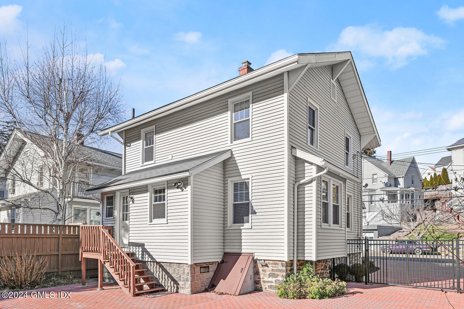 328 Delavan Avenue Greenwich, CT 06830 - Photo 25 of 29 a view of a house with a yard