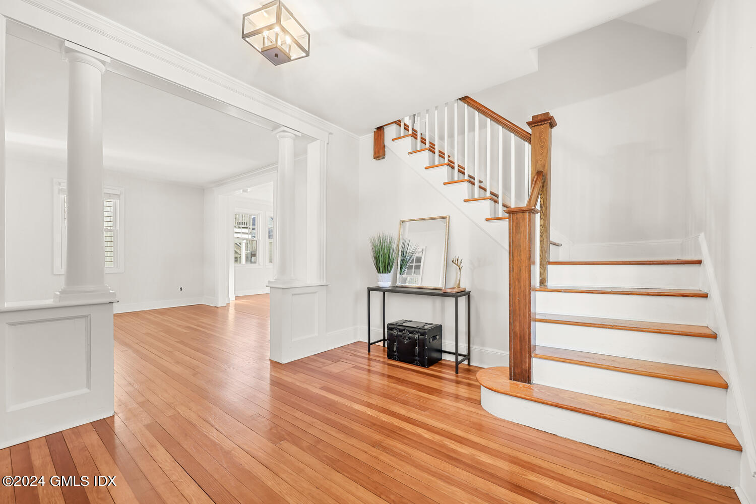 328 Delavan Avenue Greenwich, CT 06830 - Photo 5 of 29 a view of entryway and hall with wooden floor
