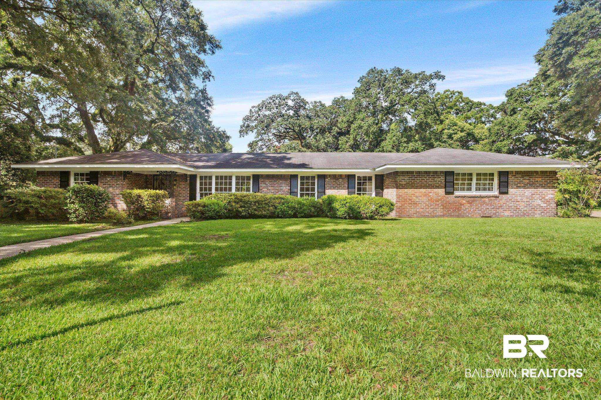1252 Helm Circle Mobile, AL 36693 - Photo 1 of 18 Single story home with a front yard