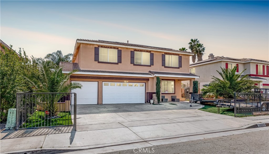3807 Seattle Street Hemet, CA 92545 - Photo 1 of 37 a front view of a house with a garden