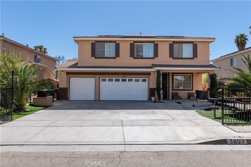 3807 Seattle Street Hemet, CA 92545 - Photo 2 of 37 a front view of house with yard