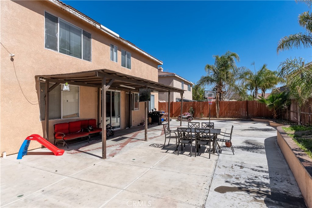 3807 Seattle Street Hemet, CA 92545 - Photo 31 of 37 a view of a chairs and table in patio