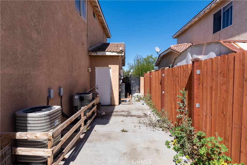 3807 Seattle Street Hemet, CA 92545 - Photo 35 of 37 a view of a backyard with sitting area