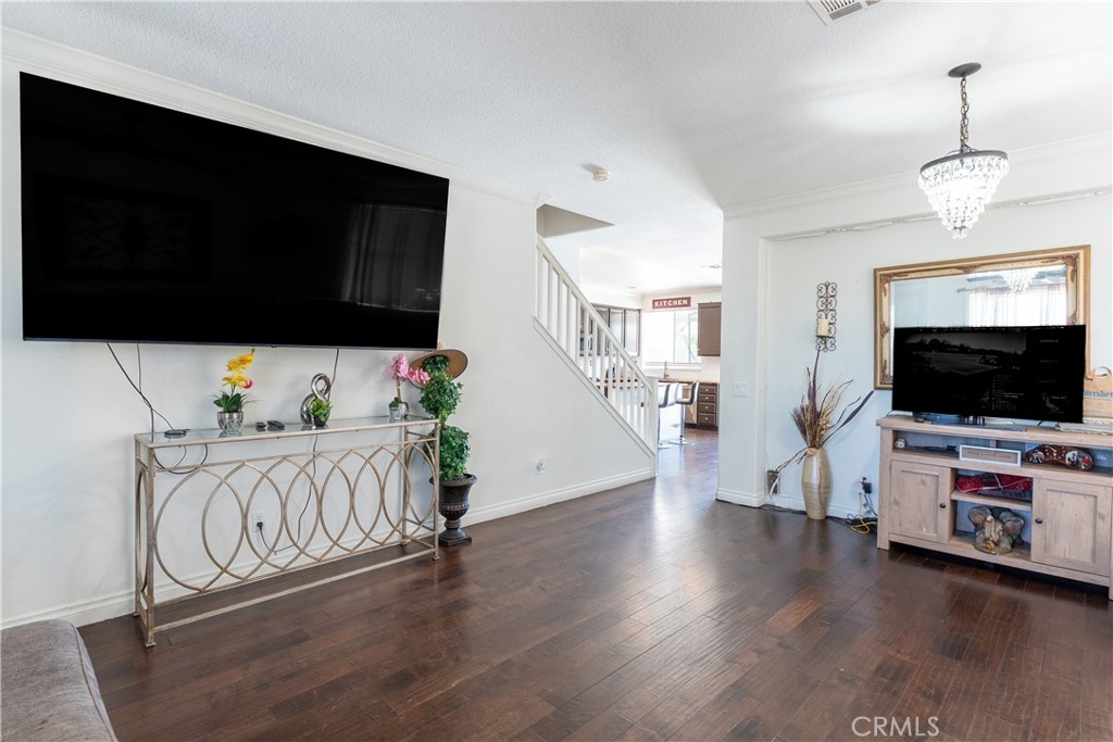 3807 Seattle Street Hemet, CA 92545 - Photo 5 of 37 a view of living room with furniture and flat screen tv