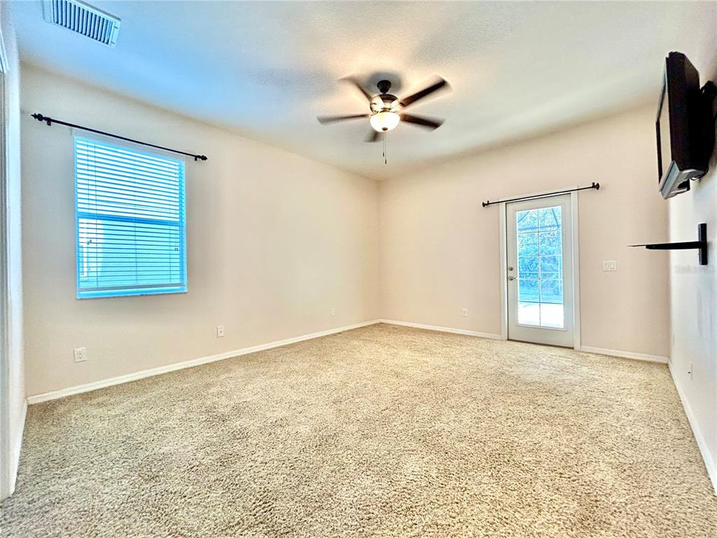 11210 Roseate Drive Tampa, FL 33626 - Photo 21 of 50 a view of empty room with window