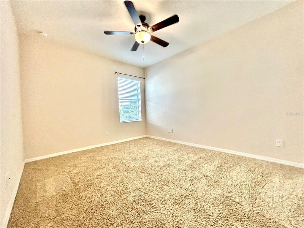 11210 Roseate Drive Tampa, FL 33626 - Photo 27 of 50 wooden floor in an empty room