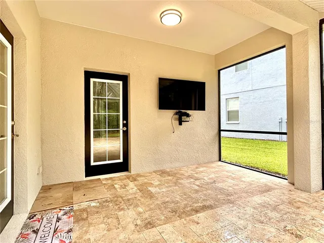 a view of a livingroom with a flat screen tv