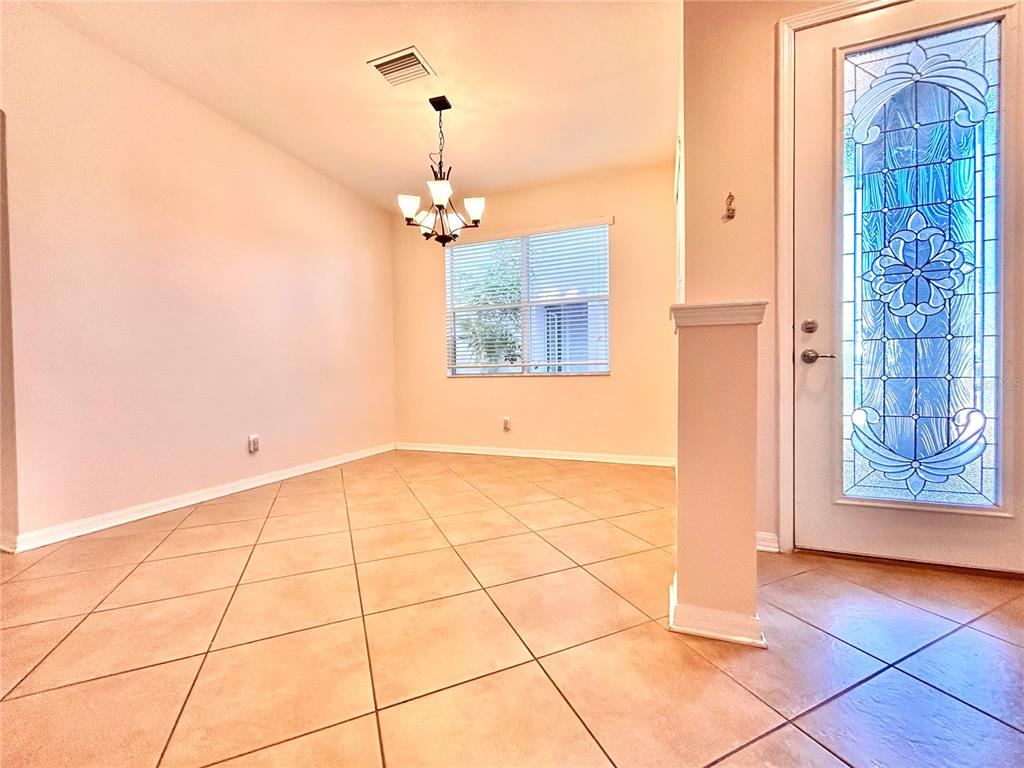 11210 Roseate Drive Tampa, FL 33626 - Photo 10 of 50 a view of an empty room with a window