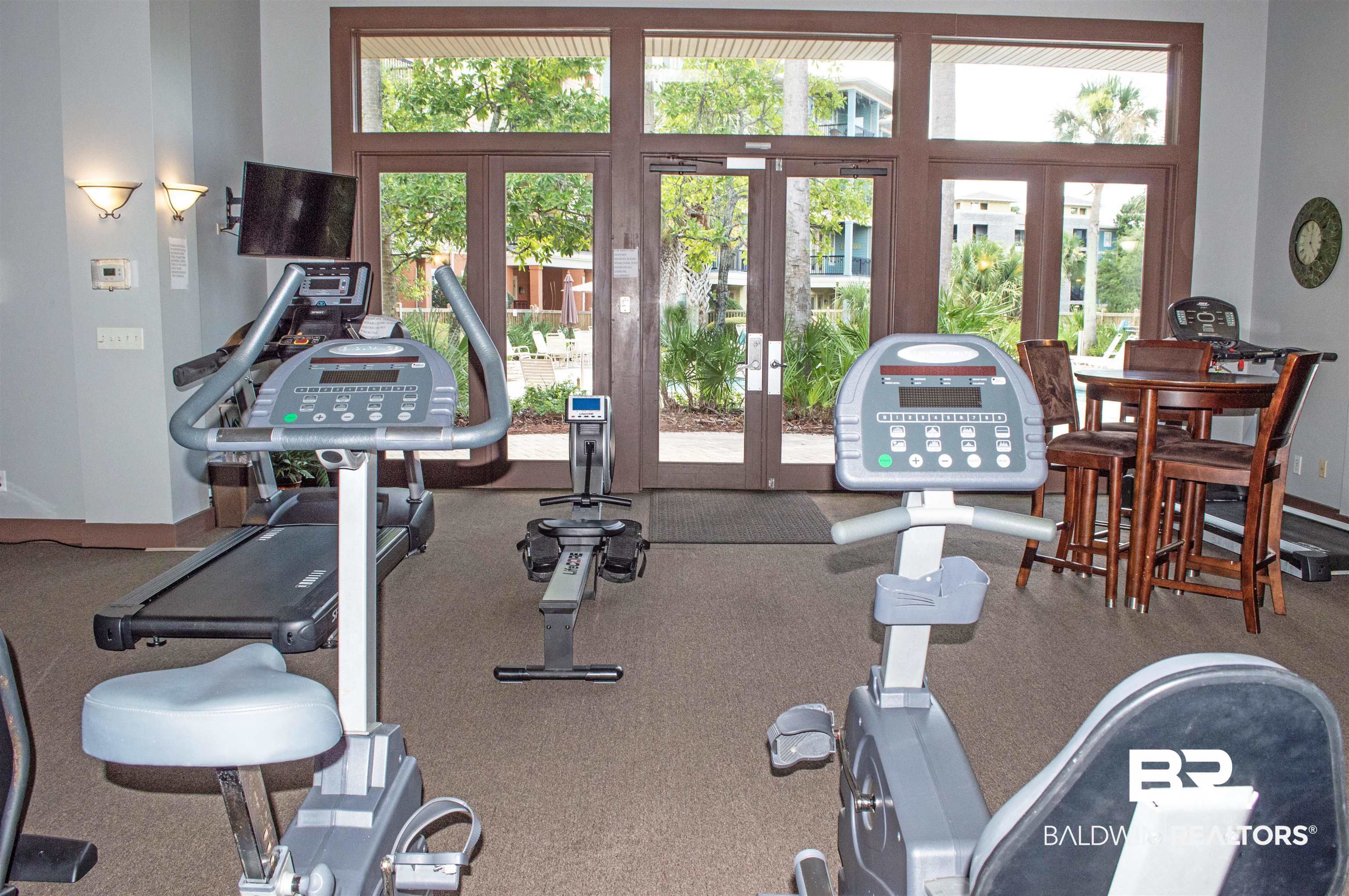 1430 Regency Road, Unit 301C Gulf Shores, AL 36542 - Photo 4 of 22 Workout area featuring french doors and carpet floors