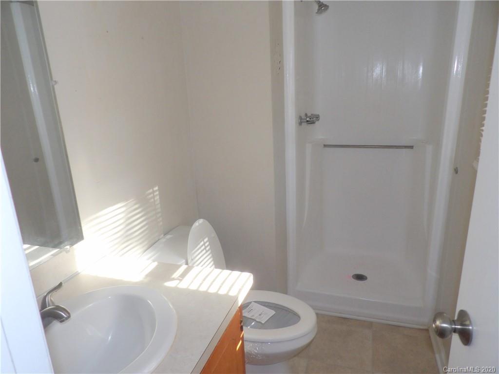 915 West Rambo Road Rock Hill, SC 29730 - Photo 10 of 14 a bathroom with a toilet and a sink