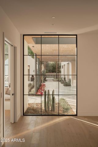 a room with a bed and a window