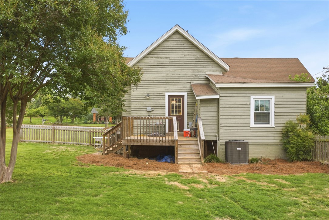 314 South Fairplay Street Seneca, SC 29678 - Photo 38 of 50 This charming home offers a spacious deck, perfect for outdoor entertaining and enjoying the surrounding yard.