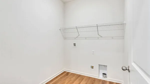 a view of a room with racks on the wall