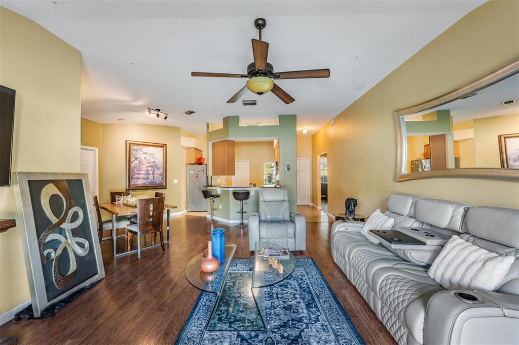 12204 Luftburrow Lane Hudson, FL 34669 - Photo 16 of 33 a living room with furniture or couch and wooden floor