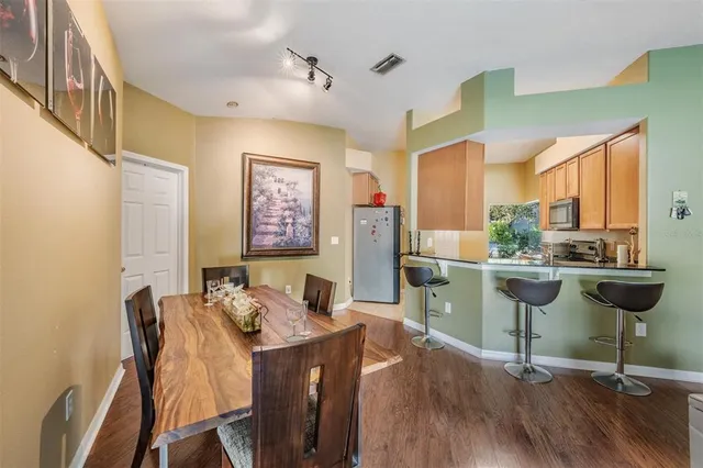 a view of a dining room with furniture