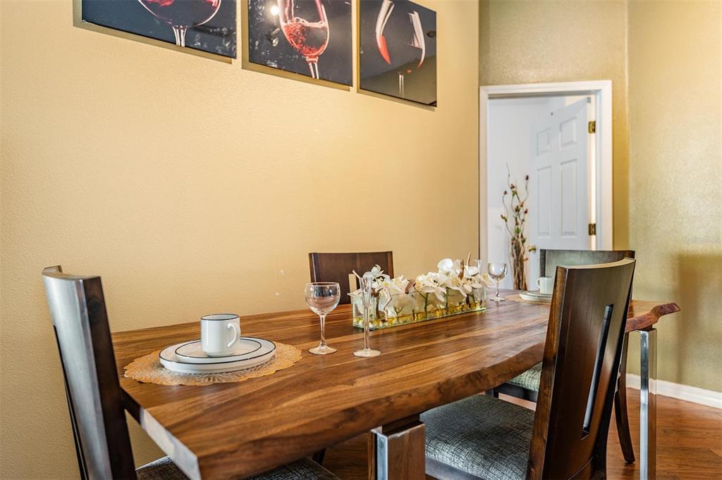 12204 Luftburrow Lane Hudson, FL 34669 - Photo 18 of 33 a view of a dining room with furniture