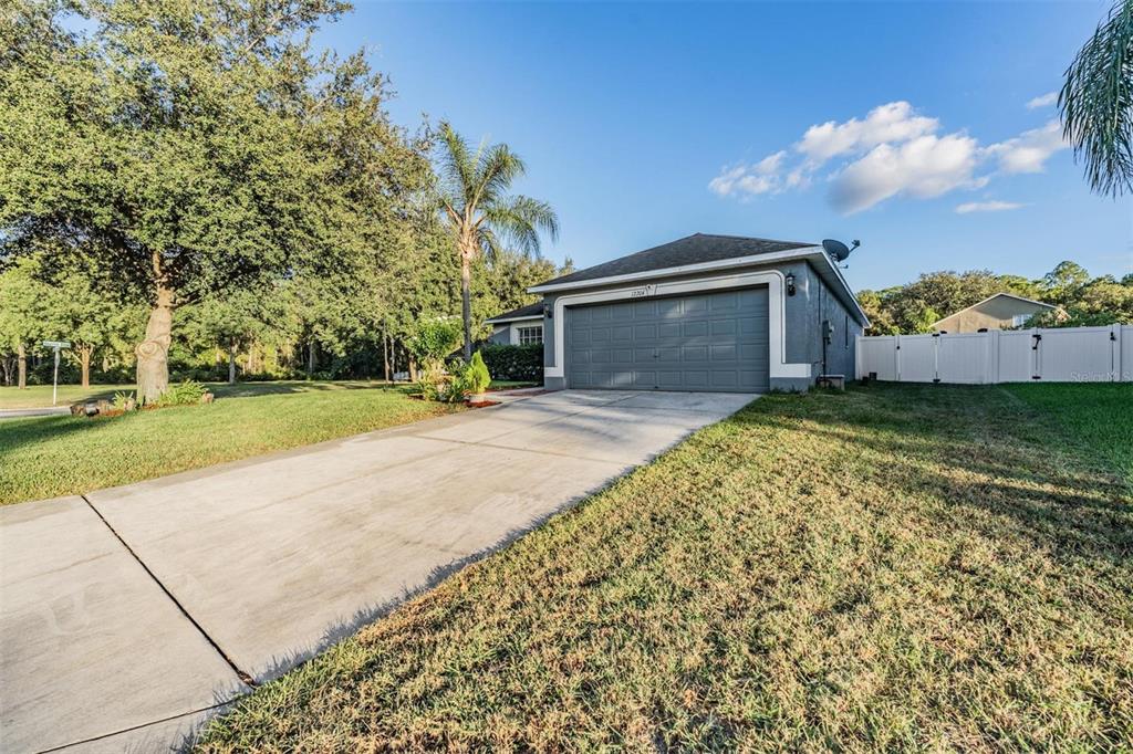 12204 Luftburrow Lane Hudson, FL 34669 - Photo 4 of 33 a view of a house with a yard