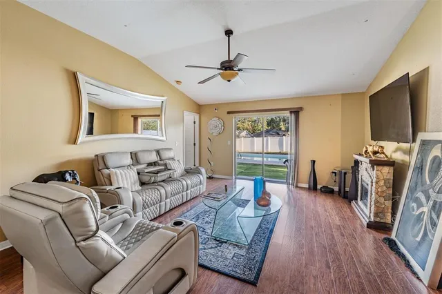 a view of a swimming pool with a yard