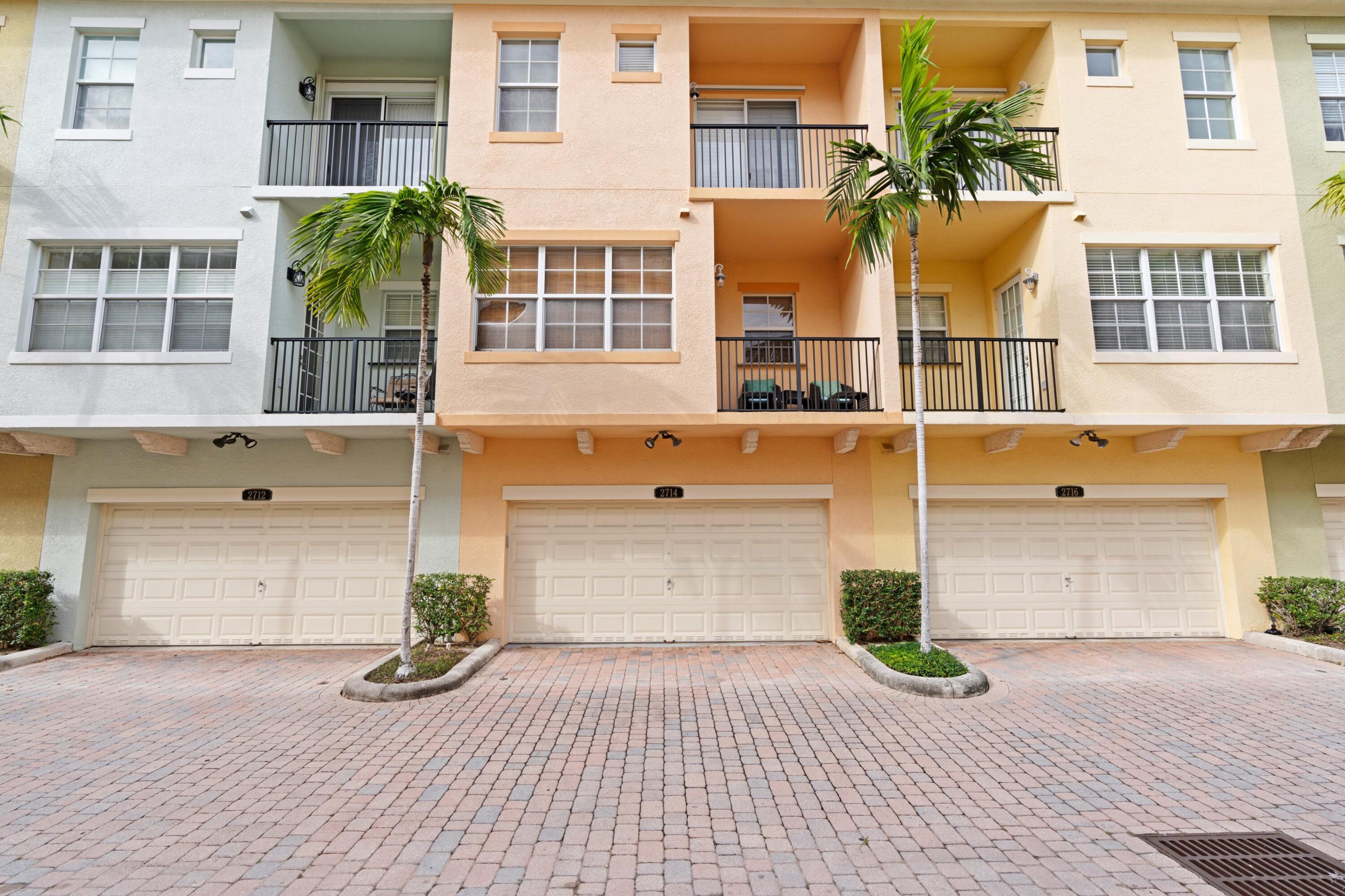 2714 Ravella Way Palm Beach Gardens, FL 33410 - Photo 25 of 27 Garage and Back