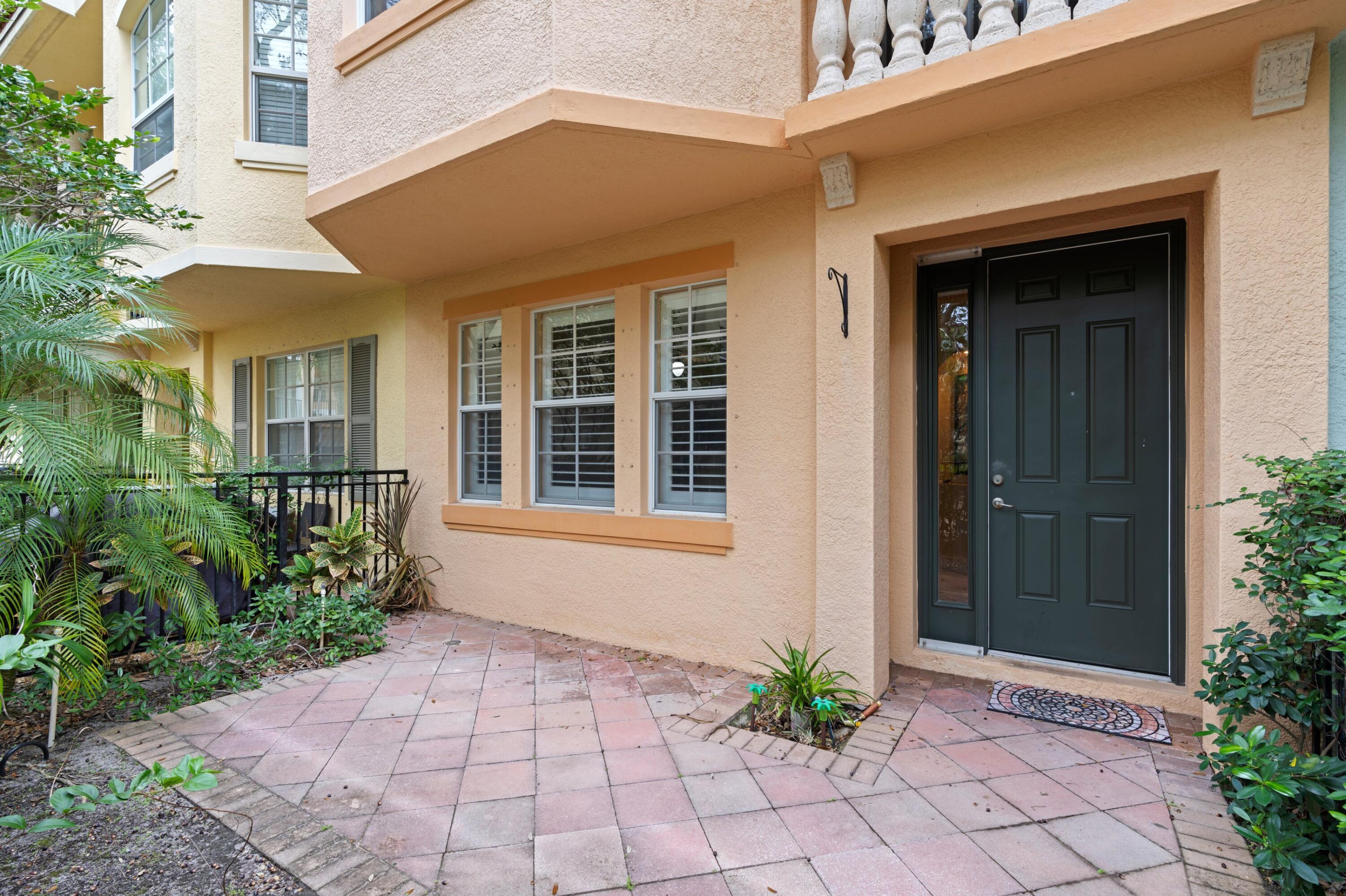 2714 Ravella Way Palm Beach Gardens, FL 33410 - Photo 4 of 27 Entry Patio