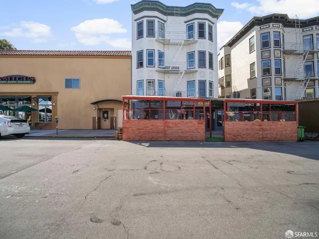 a view of building with large windows