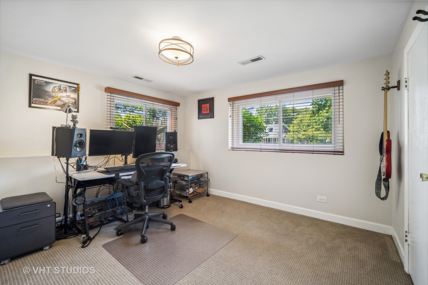 221 West Harrison Road Lombard, IL 60148 - Photo 18 of 24 a view of a workspace with furniture and a window