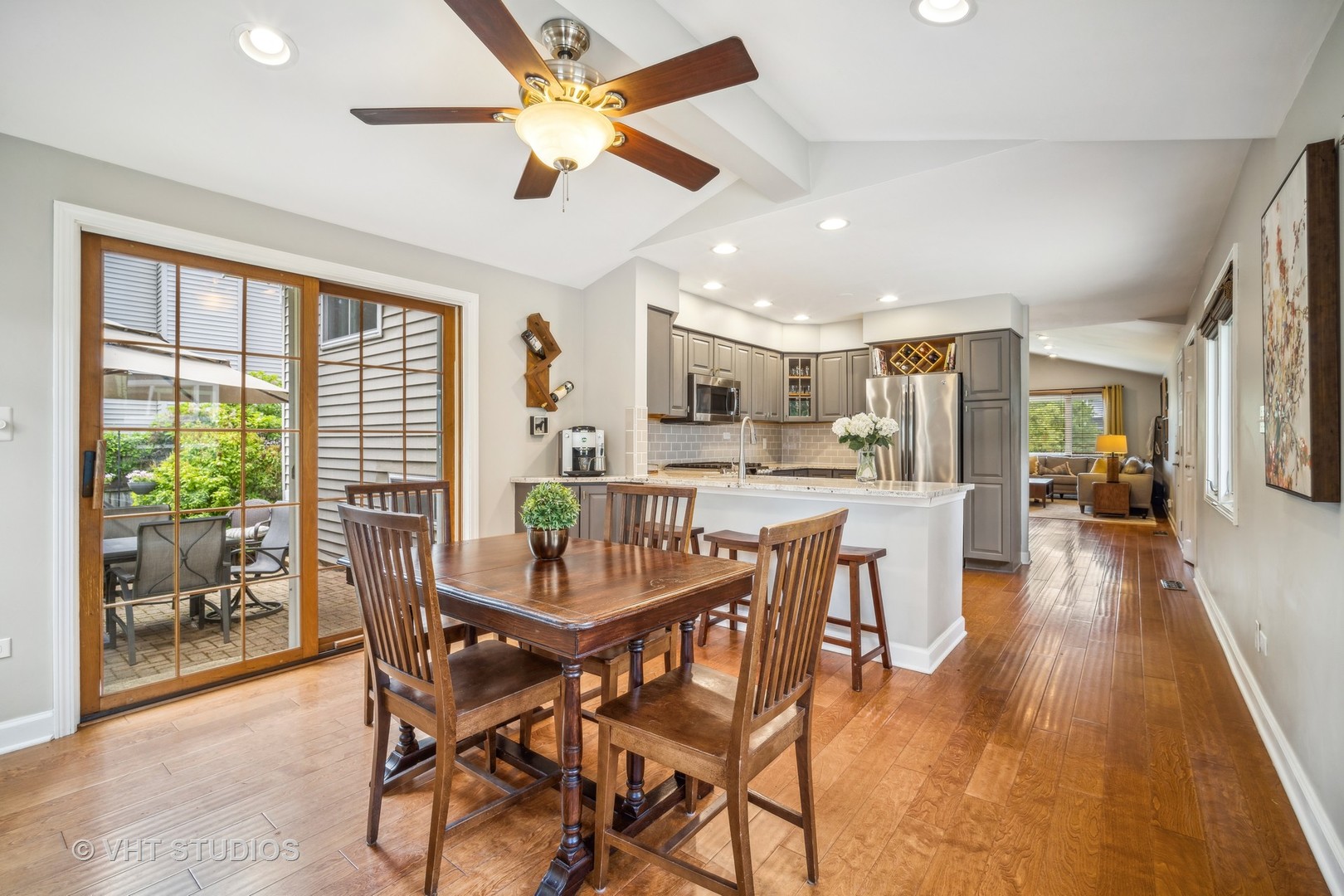 221 West Harrison Road Lombard, IL 60148 - Photo 4 of 24 a dining room with furniture and a floor to ceiling window