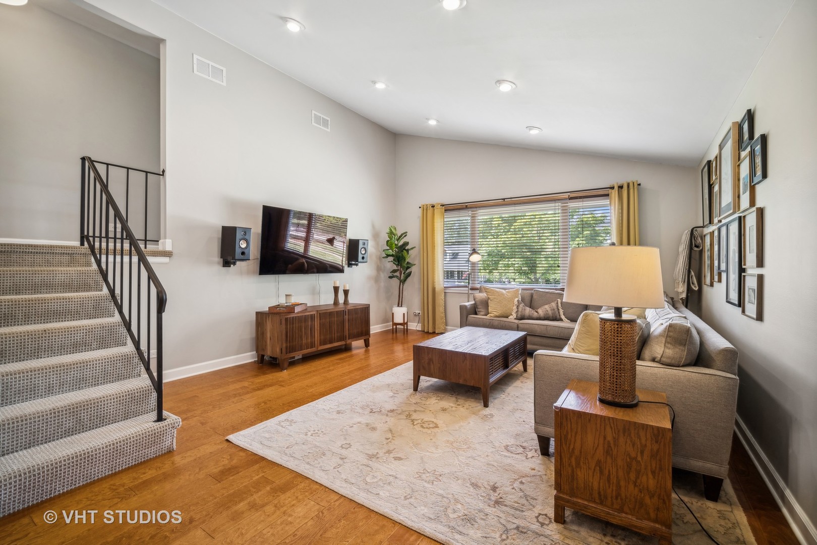221 West Harrison Road Lombard, IL 60148 - Photo 7 of 24 a living room with furniture and a flat screen tv