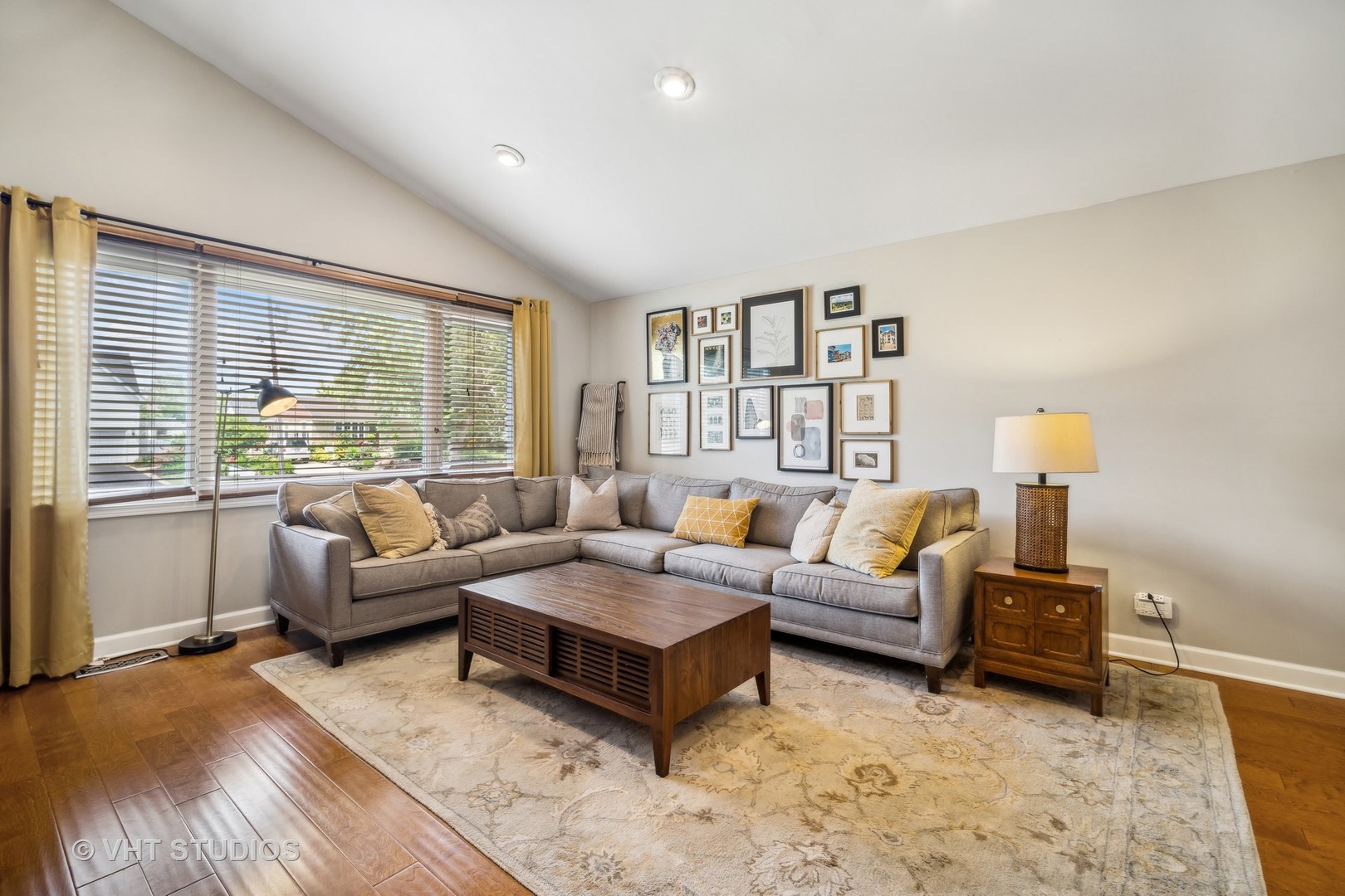 221 West Harrison Road Lombard, IL 60148 - Photo 8 of 24 a living room with furniture and a large window
