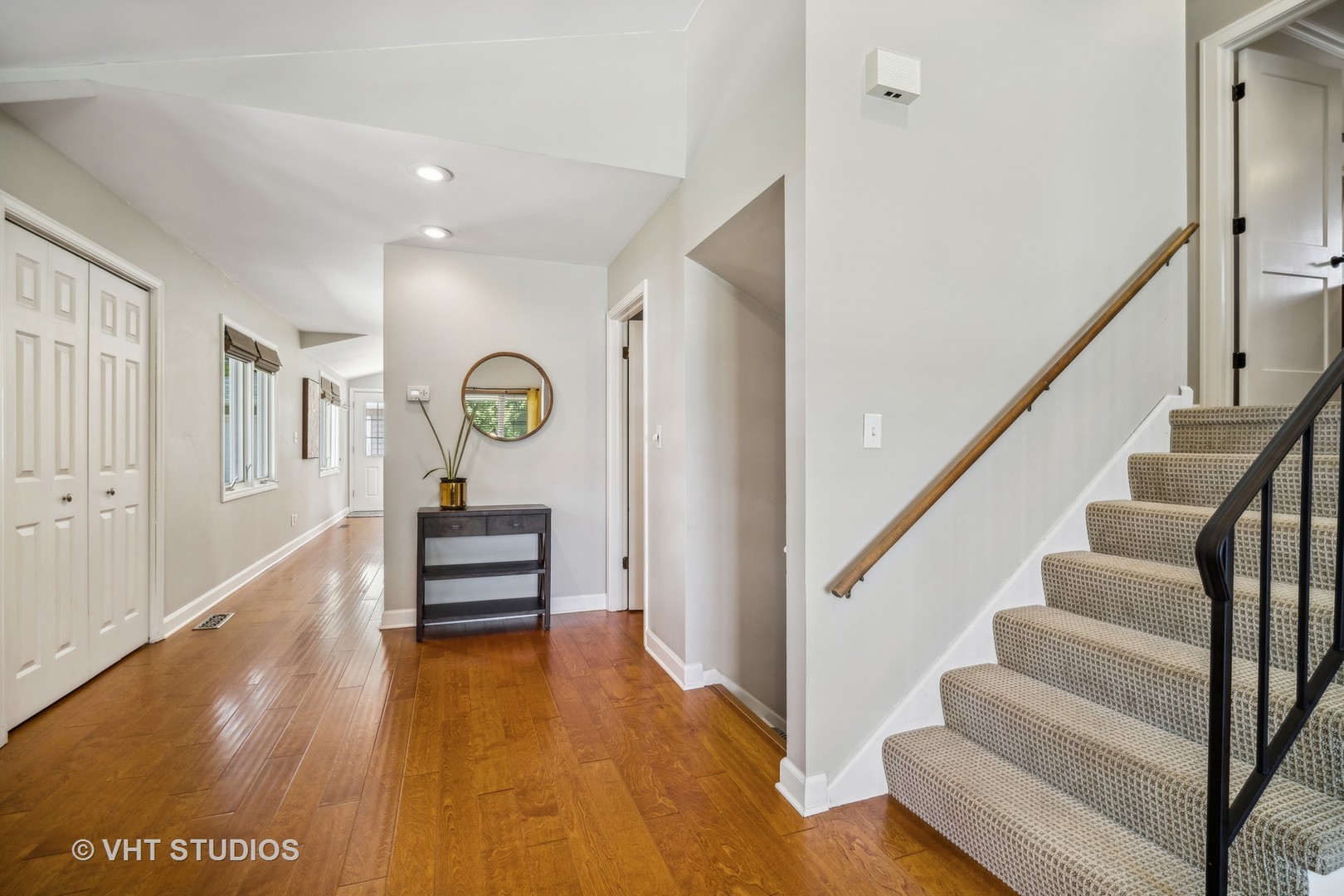 221 West Harrison Road Lombard, IL 60148 - Photo 9 of 24 a view of entryway and hall with wooden floor