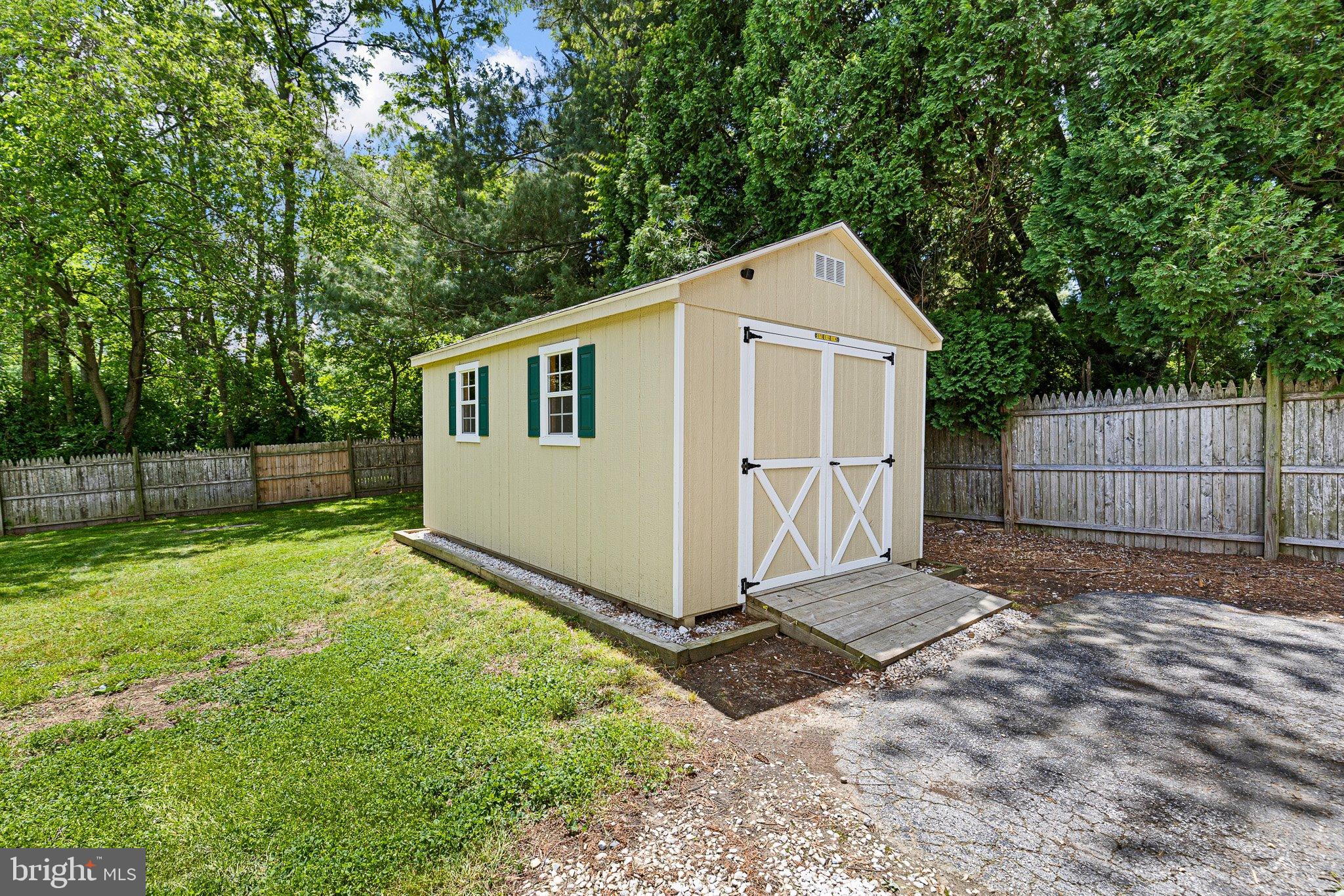 370 Big Elk Chapel Road Elkton, MD 21921 - Photo 26 of 29 a front view of a house with a yard