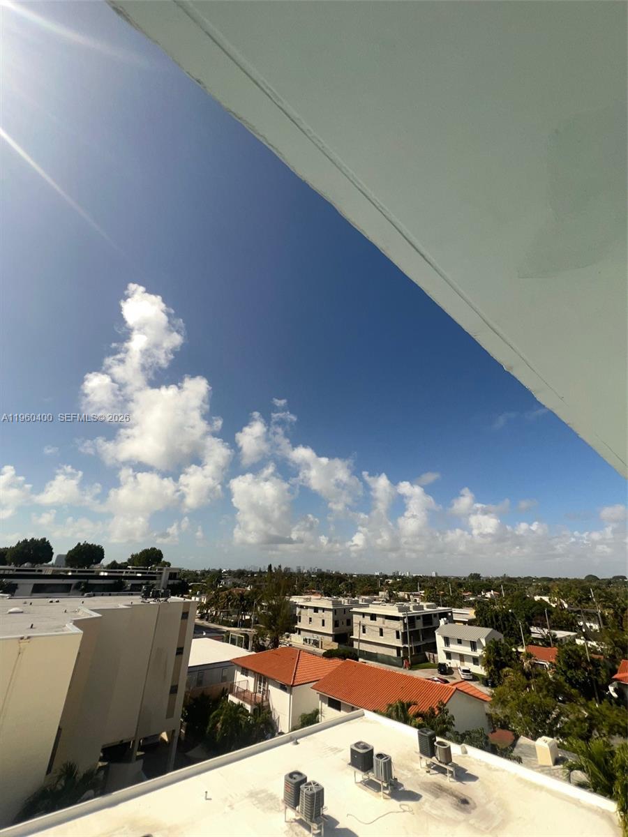 9156 Collins Avenue, Unit 502 Surfside, FL 33154 - Photo 19 of 20 a view of a terrace with skyline