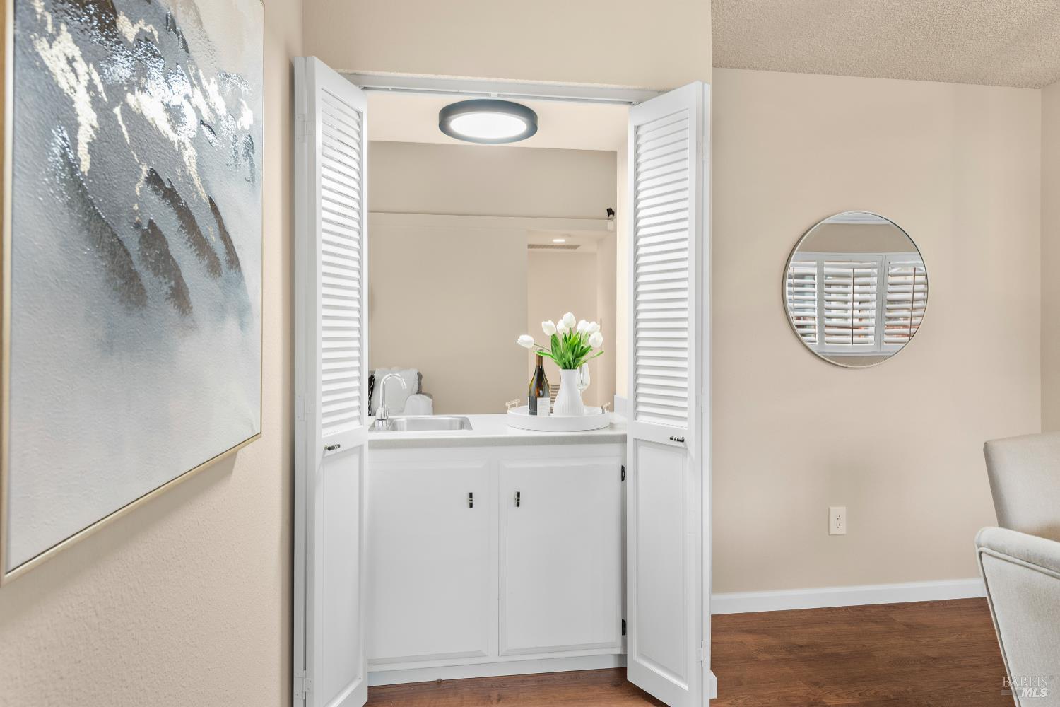 8853 Oak Trail Court Santa Rosa, CA 95409 - Photo 11 of 39 Convenient wet bar is dual-sided