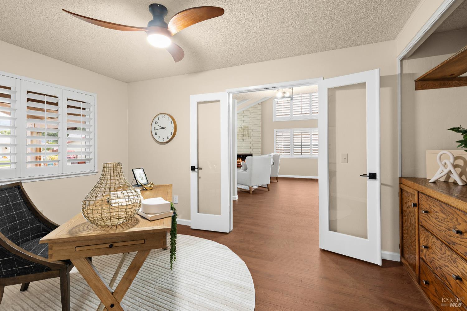 8853 Oak Trail Court Santa Rosa, CA 95409 - Photo 30 of 39 Vaulted great room with a large fireplace