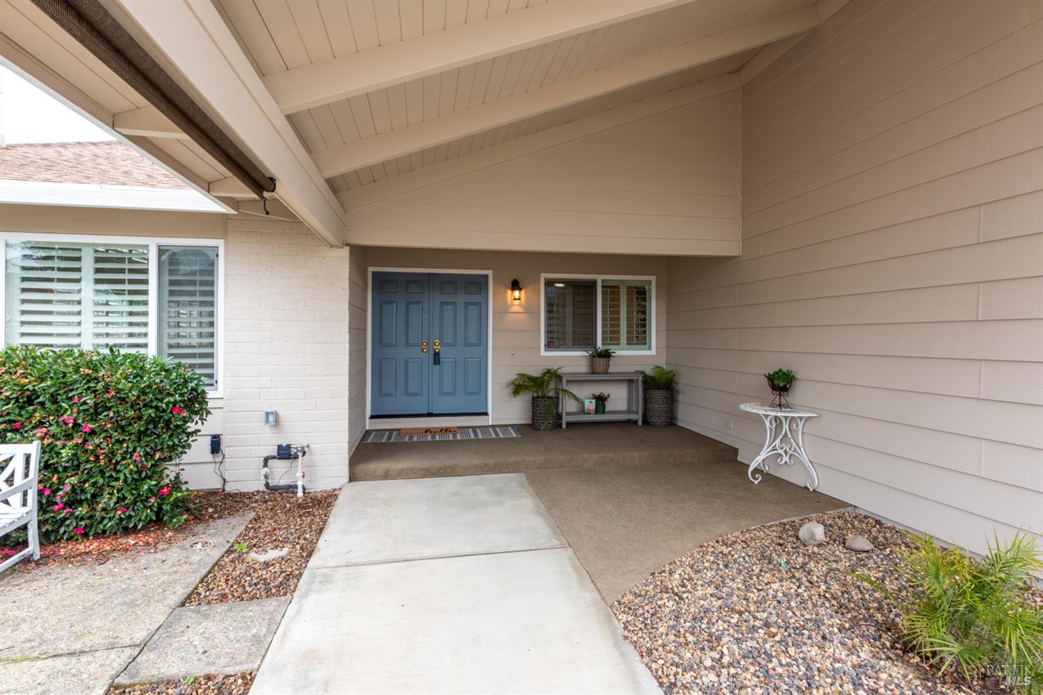 8853 Oak Trail Court Santa Rosa, CA 95409 - Photo 4 of 39 Seamless indoor-outdoor transition with a covered porch at the entry with multi dimensional architectural interest
