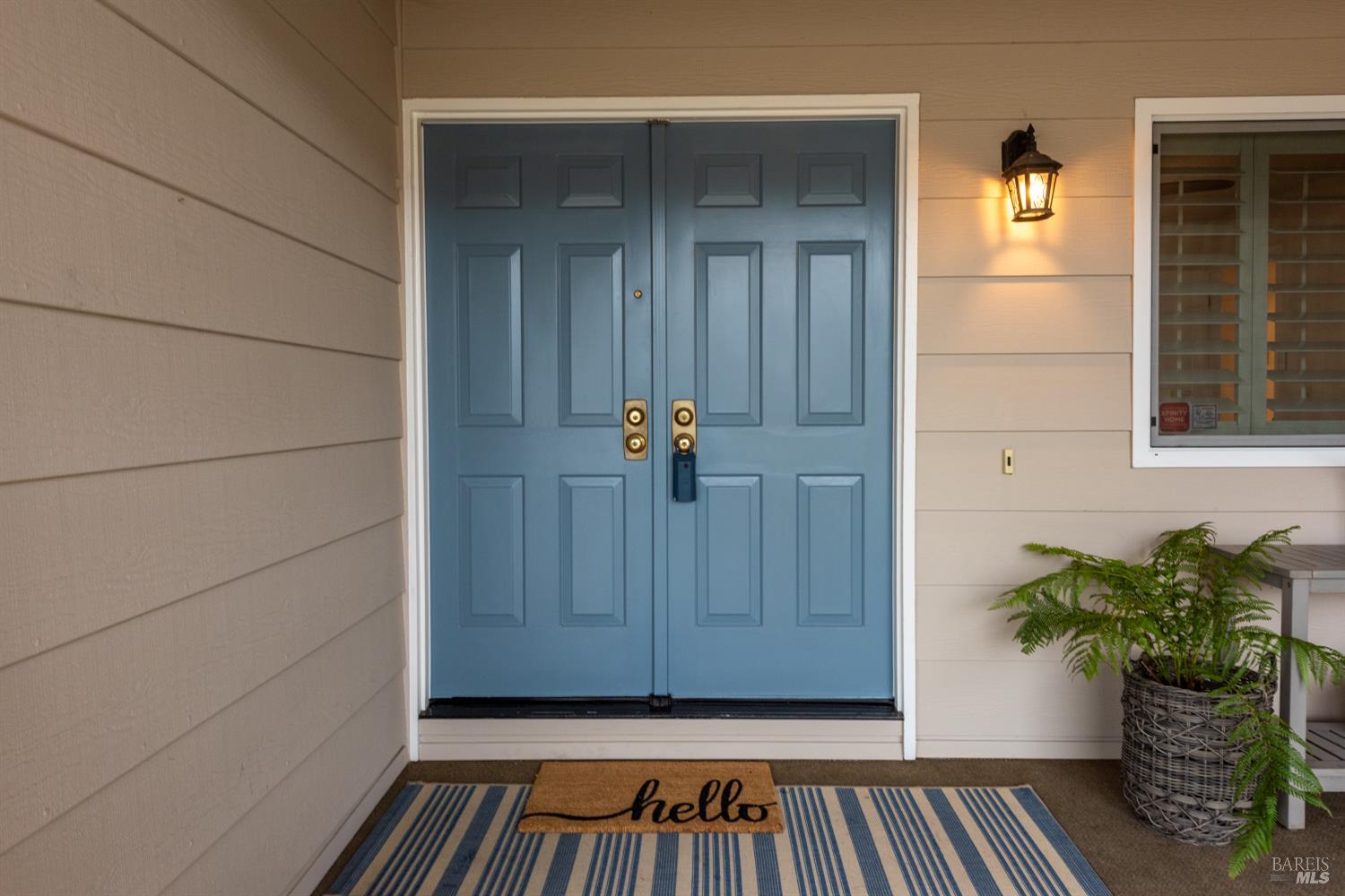 8853 Oak Trail Court Santa Rosa, CA 95409 - Photo 6 of 39 Board and batten siding and a stylish double door entry into this move-in ready retreat in a premier location tucked away in a cul-de-sac