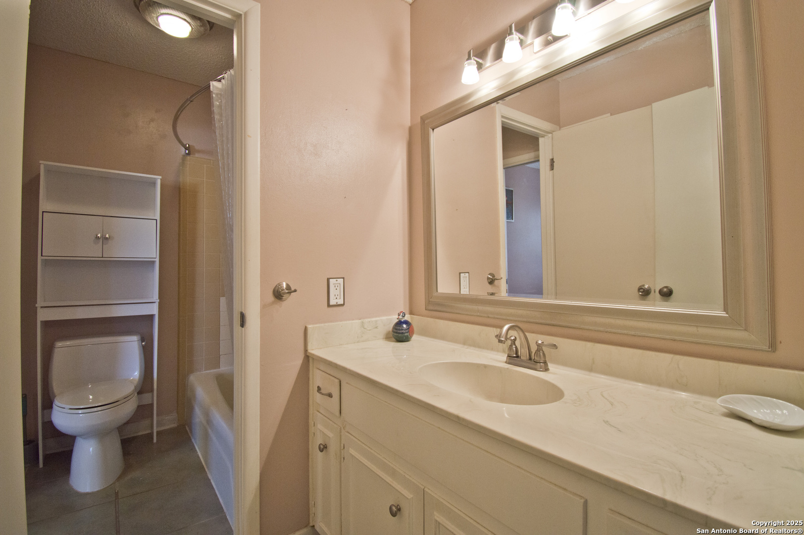 6427 Wurzbach Road, Unit 4 San Antonio, TX 78240 - Photo 18 of 30 a bathroom with a sink and a toilet
