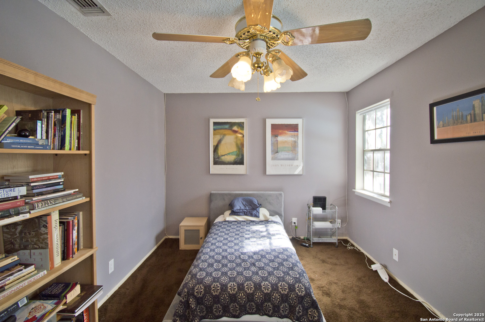 6427 Wurzbach Road, Unit 4 San Antonio, TX 78240 - Photo 22 of 30 a bedroom with bed and a window
