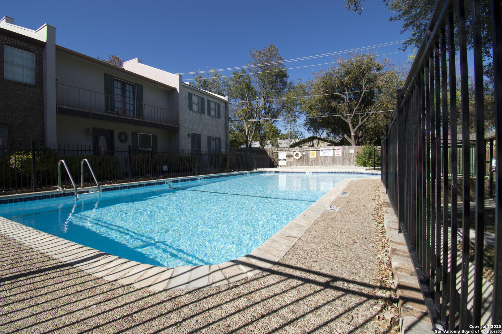 6427 Wurzbach Road, Unit 4 San Antonio, TX 78240 - Photo 27 of 30 a view of a backyard with plants and a patio