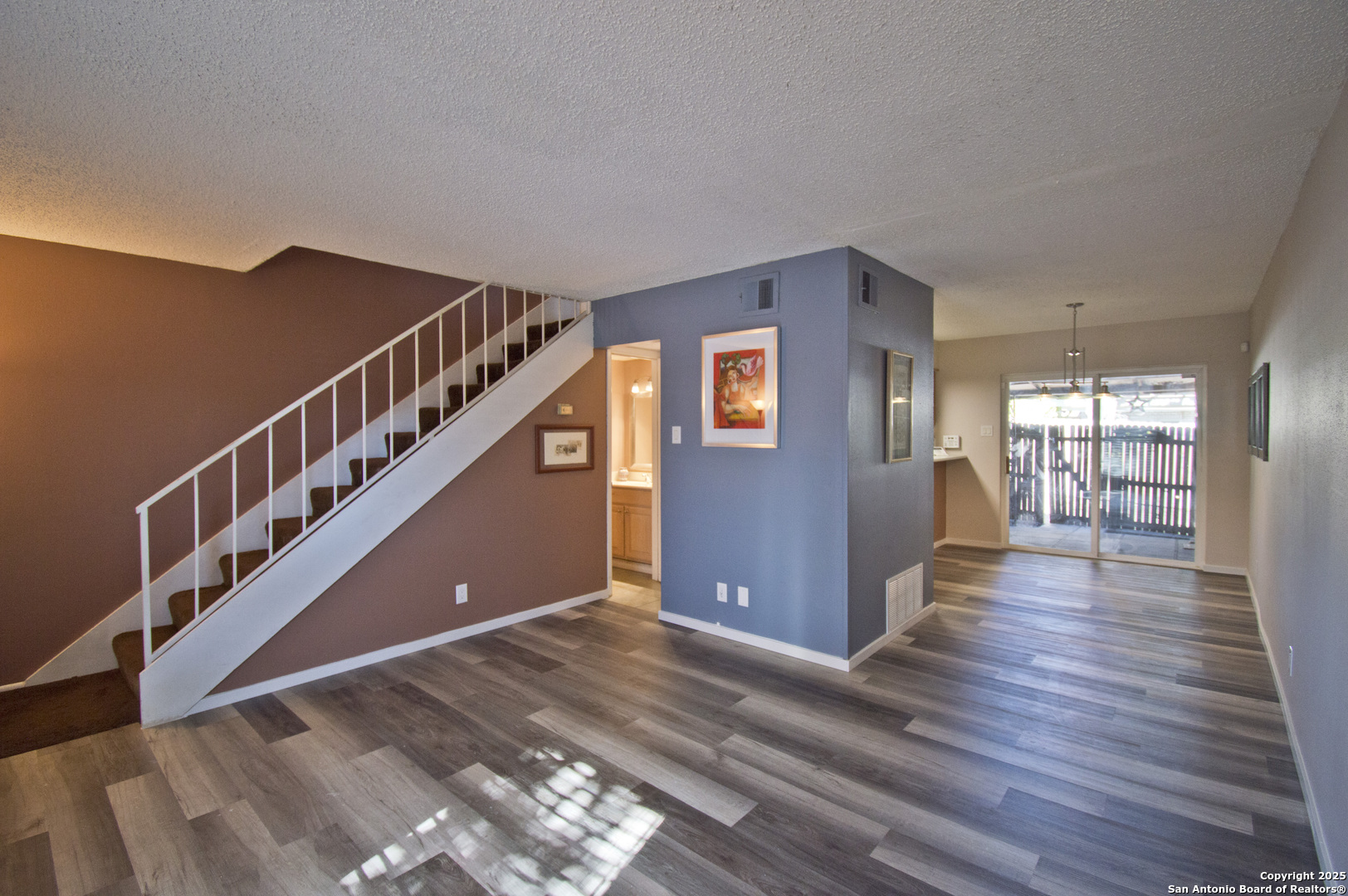 6427 Wurzbach Road, Unit 4 San Antonio, TX 78240 - Photo 4 of 30 a view of entryway and hall with wooden floor