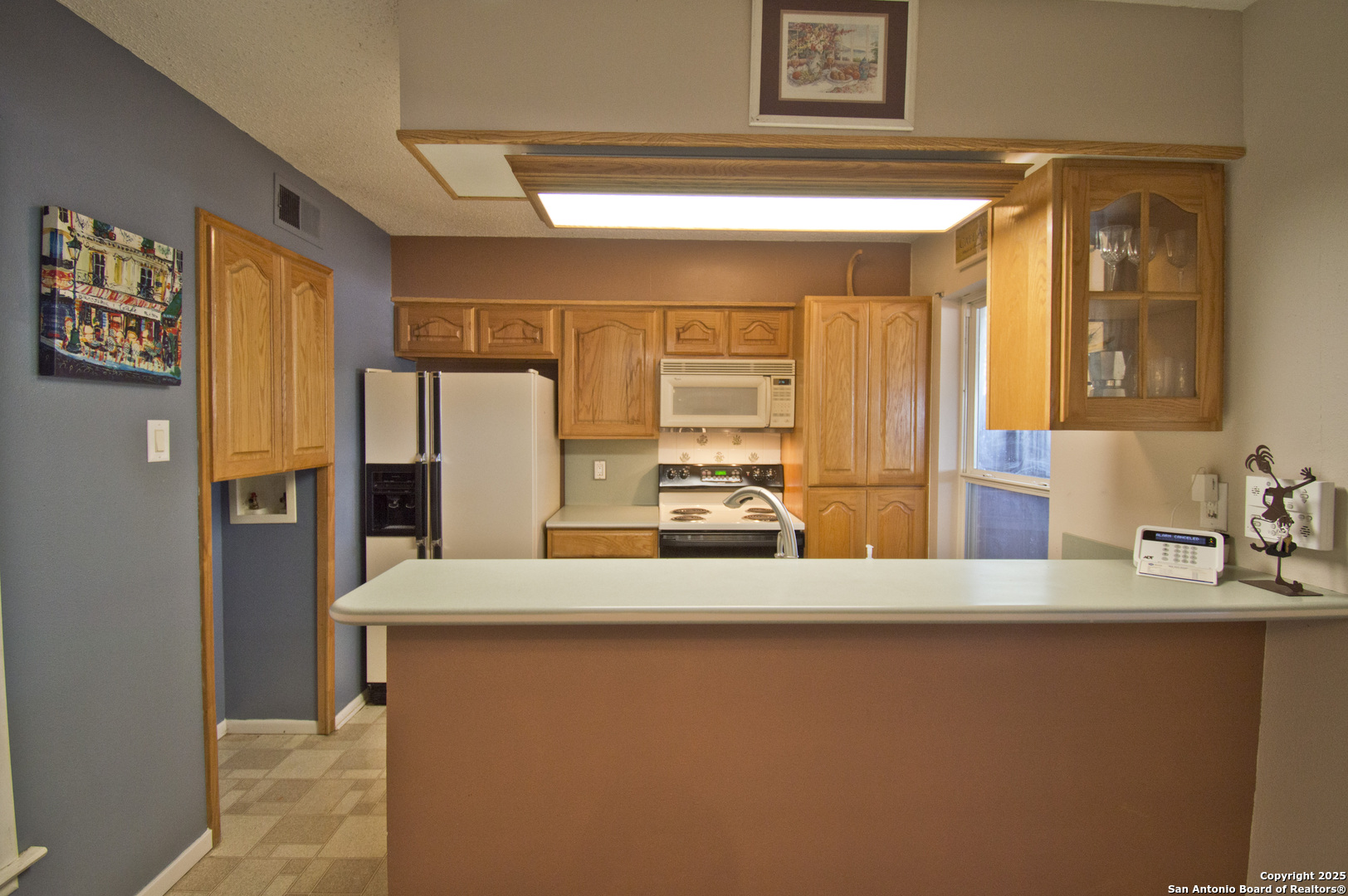 6427 Wurzbach Road, Unit 4 San Antonio, TX 78240 - Photo 9 of 30 a bathroom with a sink and a mirror