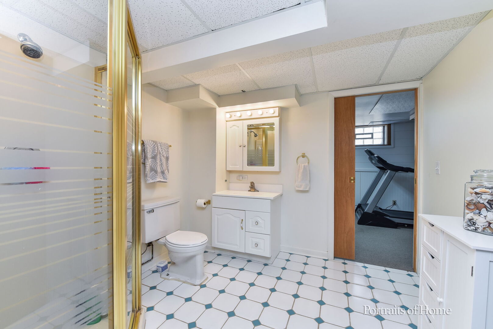 856 North Webster Street Naperville, IL 60563 - Photo 17 of 21 a bathroom with a sink a toilet and shower