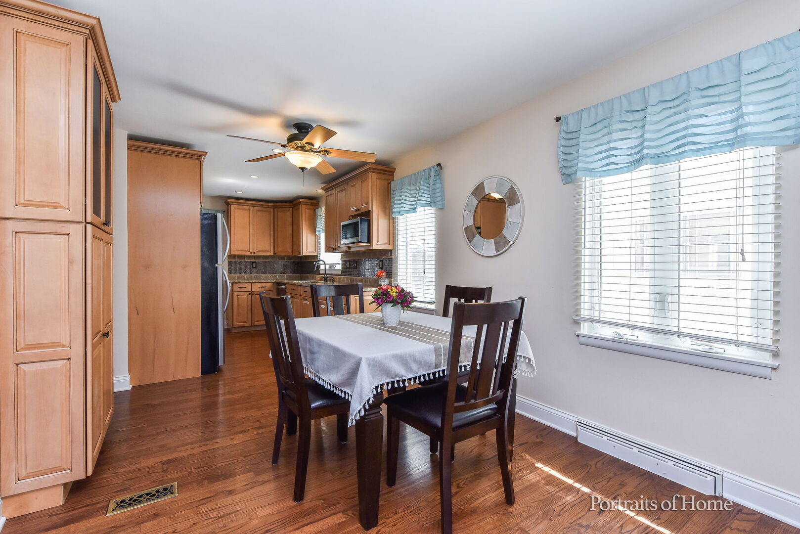 856 North Webster Street Naperville, IL 60563 - Photo 5 of 21 a view of a dining room with furniture window and wooden floor