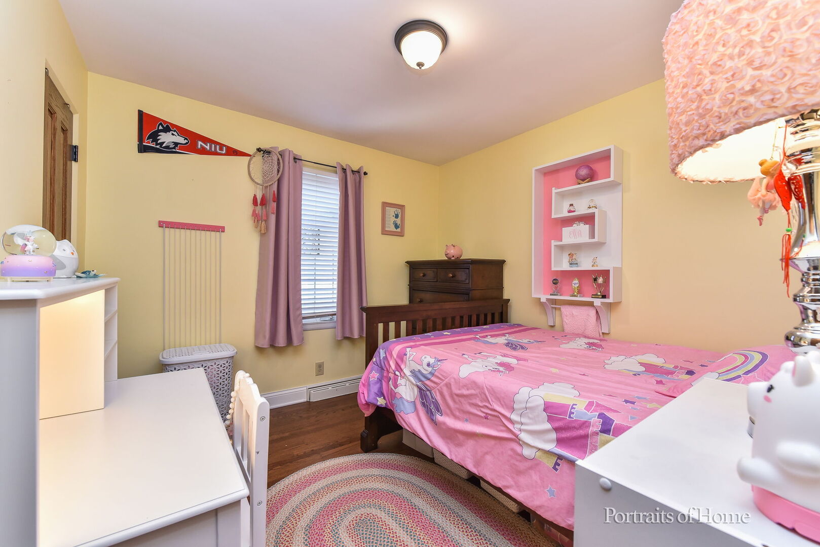 856 North Webster Street Naperville, IL 60563 - Photo 9 of 21 a bedroom with a bed and a dresser