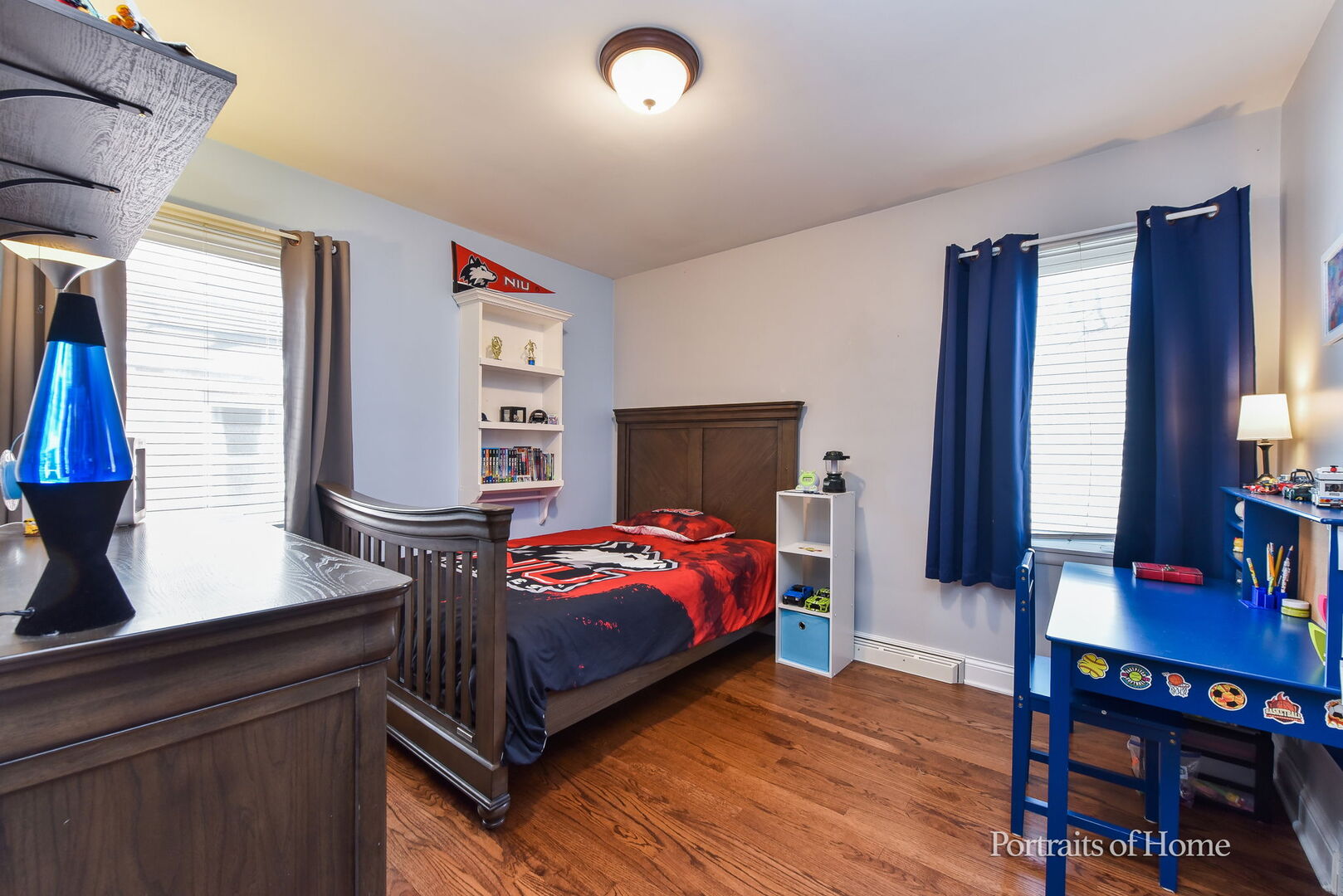 856 North Webster Street Naperville, IL 60563 - Photo 10 of 21 a bedroom with a bed and wooden floor